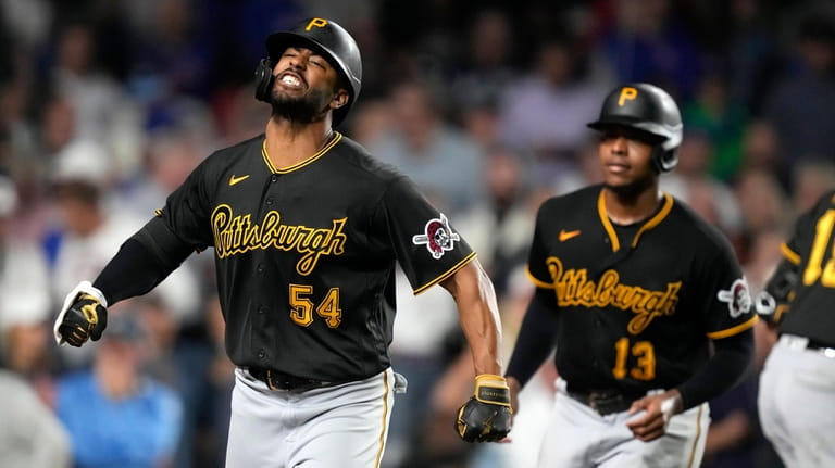 Pittsburgh Pirates' Joshua Palacios celebrates his pinch-hit, three-run home run...