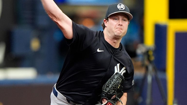 Yankees pitcher Gerrit Cole throws a bullpen session before a...