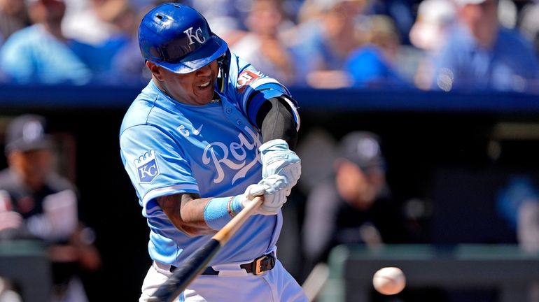 Kansas City Royals' Salvador Perez hits an RBI single during...