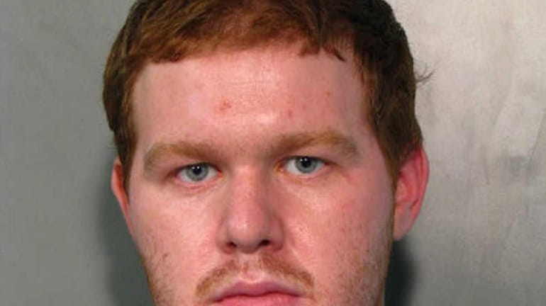 Matthew Levine, 22, of Westbury, is charged with burglary, assault,...