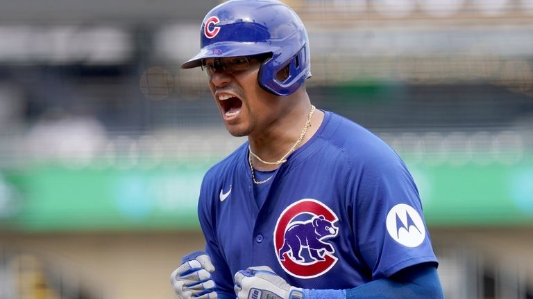 Chicago Cubs' Christian Bethancourt celebrates his RBI single during the...