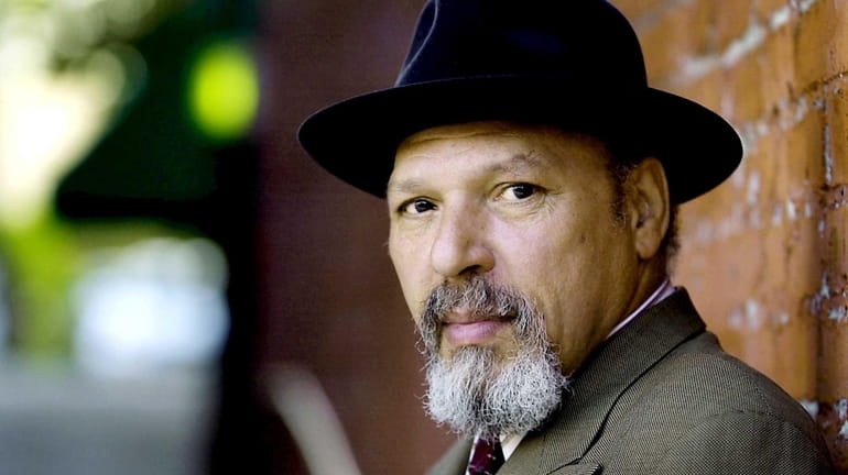 Pulitzer Prize-winning playwright August Wilson poses during a visit to...
