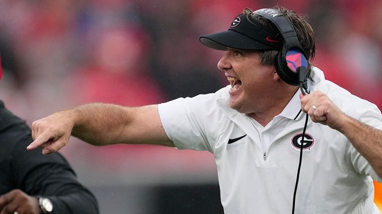 Georgia head coach Kirby Smart yells to his players on...