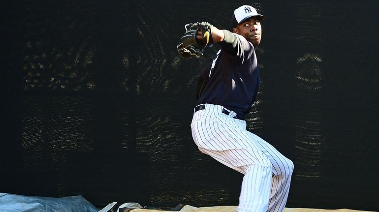 New York Yankees' Aroldis Chapman throws a bullpen session during...