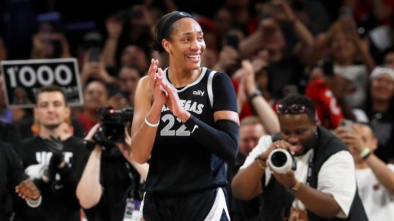 Las Vegas Aces center A'ja Wilson (22) celebrates during the...