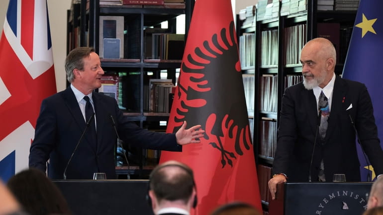 British Foreign Secretary David Cameron, left, and Albania's Prime Minister...