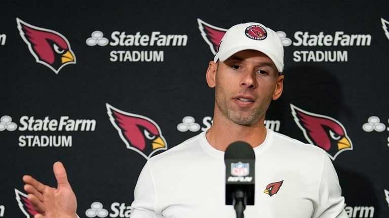 Arizona Cardinals head coach Jonathan Gannon answers a question during...