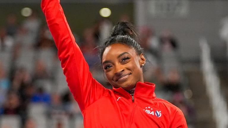 Simone Biles reacts after being named to the U.S. women's...