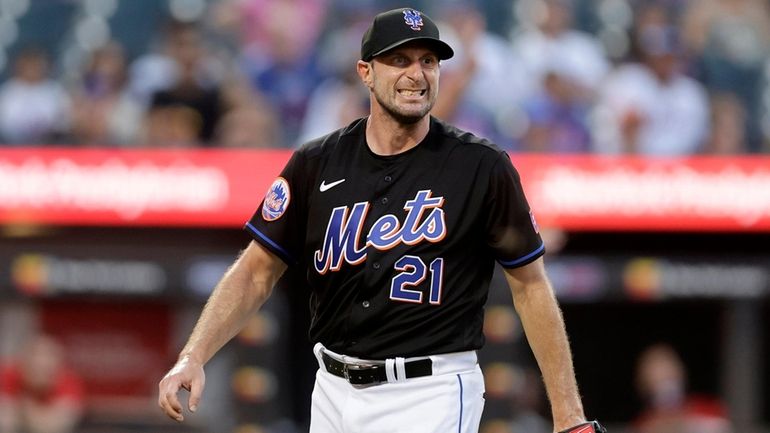 Max Scherzer of the Mets reacts after the second inning against the...