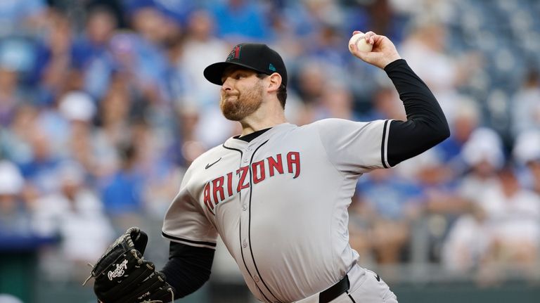 Arizona Diamondbacks pitcher Jordan Montgomery delivers to a Kansas City...