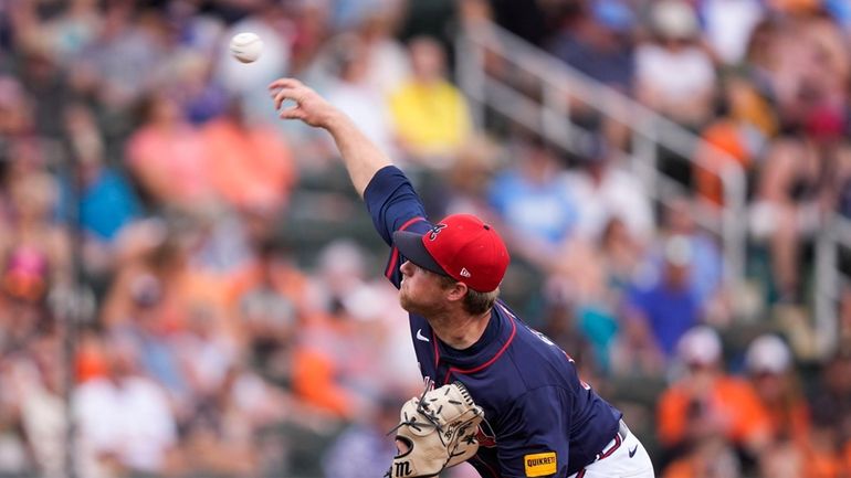 Atlanta Braves starting pitcher Bryce Elder throws in the third...