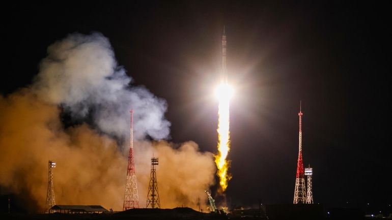 In this photo released by Roscosmos space corporation, the Soyuz-2.1...