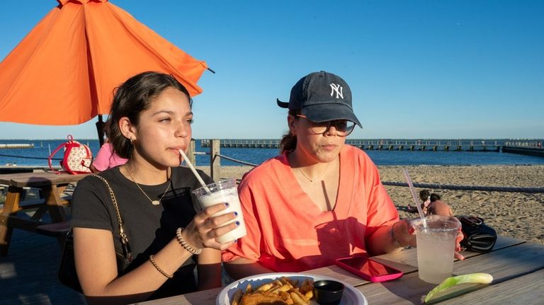 Jennifer Rivera and her daughter Kaitlin, 15, of East Islip,...