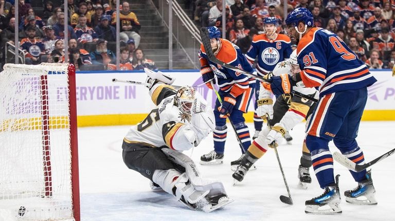 Vegas Golden Knights goalie Logan Thompson (36) is scored on...