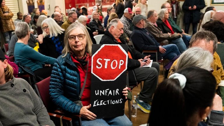 Poppy Johnson of Greenport, one of over 125 people who...