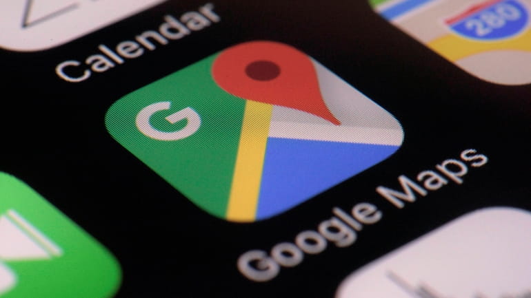 The Google Maps app is seen on a smartphone, March...