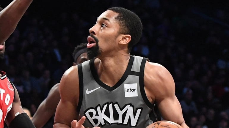 Nets guard Spencer Dinwiddie looks for shooting space against Toronto...