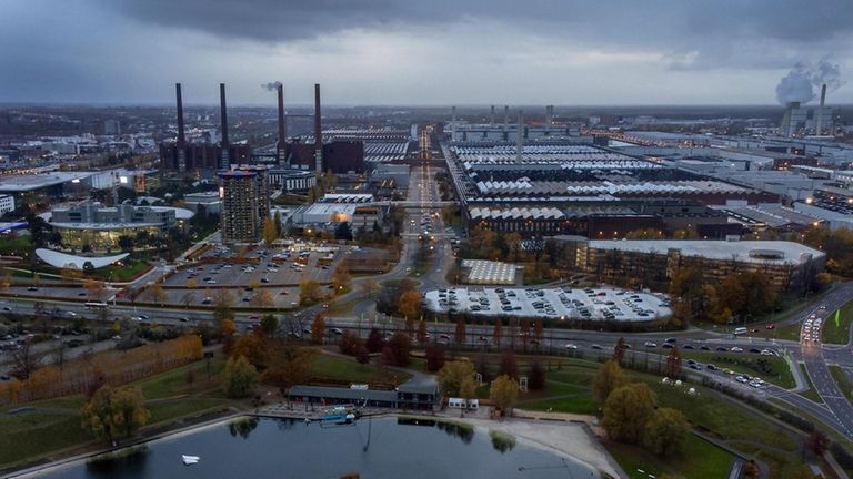 Smoke rises from a chimney of the Volkswagen car factory...