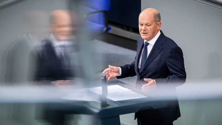 Federal Chancellor Olaf Scholz speaks at a government statement on...