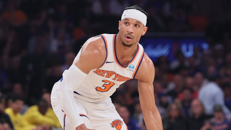 Knicks guard Josh Hart dribbles during the first quarter in Game...
