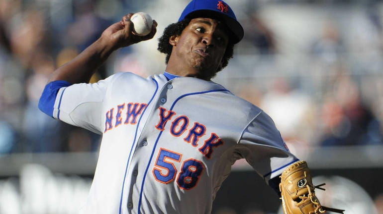 Jenrry Mejia pitches during the first inning against the San...