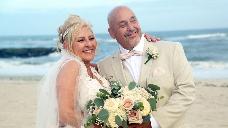 Margaret Famiglietti and Ray Tavarez on their wedding day.