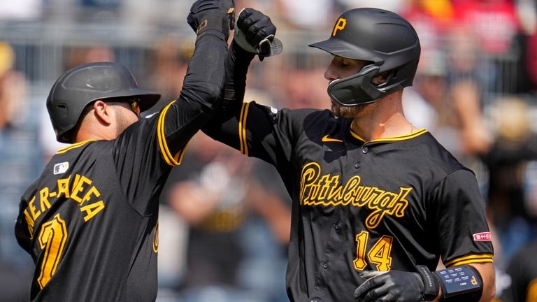 Pittsburgh Pirates' Joey Bart (14) celebrates with Isiah Kiner-Falefa, left,...