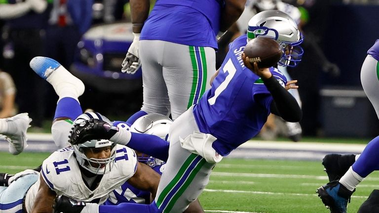 Seattle Seahawks quarterback Geno Smith (7) attempts to throw a...