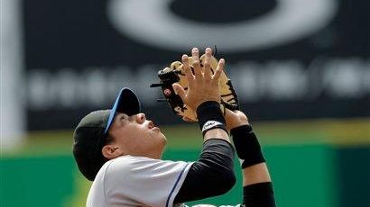 Wilmer Flores waits to catch an infield pop up during...