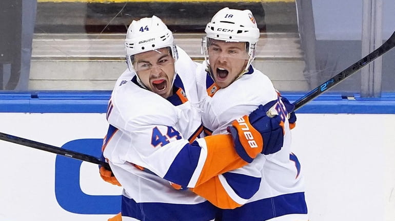 The Islanders' Jean-Gabriel Pageau, left, and Anthony Beauvillier celebrate Pageau's goal at...