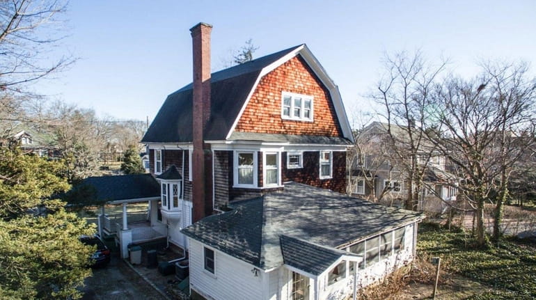 The Rockville Centre home, in the early 1900s, offers four bedrooms,...