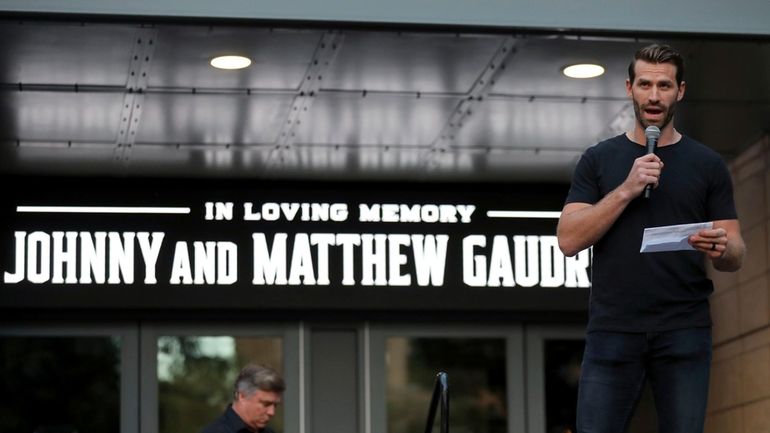 Columbus Blue Jackets player Boone Jenner speaks during the candlelight...