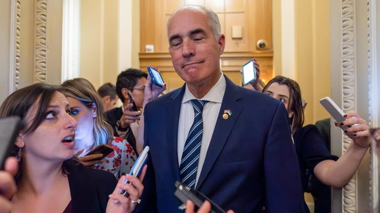 Sen. Bob Casey, D-Pa., pauses while speaking with reporters after...