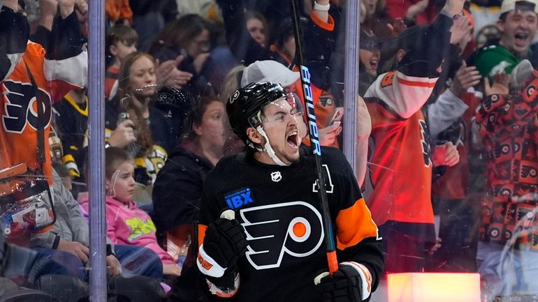 Philadelphia Flyers' Travis Konecny reacts after scoring a goal during...