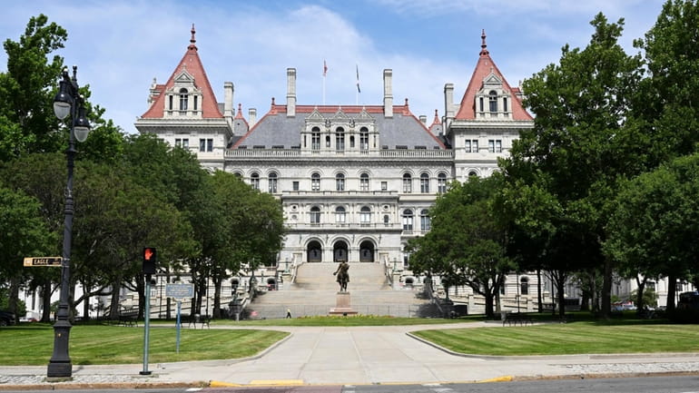 The New York State Capitol in Albany. The State Legislature must...