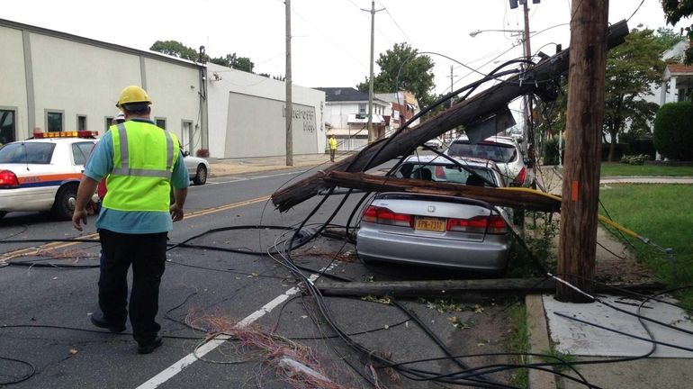 Scene in Elmont on Meacham Avenue where wires and poles...