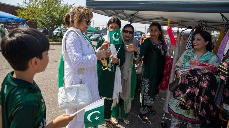 Ruumana Chowdhury from Farmingville, left, Zara Saqib from Franklin Square,...