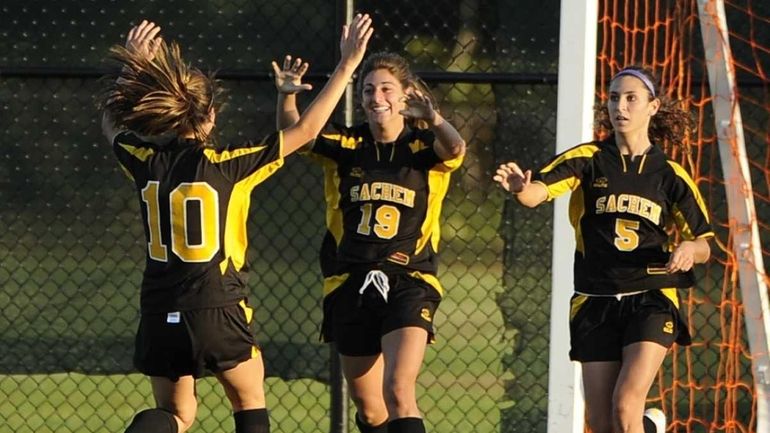 Sachem North forward Leanna Curcio, center, celebrates her goal against...