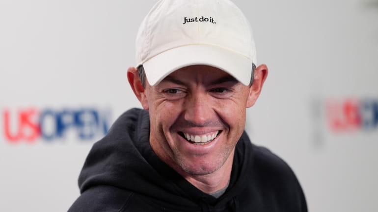 Rory McIlroy, of Northern Ireland, speaks during a news conference...