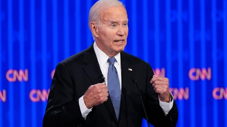 President Joe Biden speaks during a presidential debate with Republican...