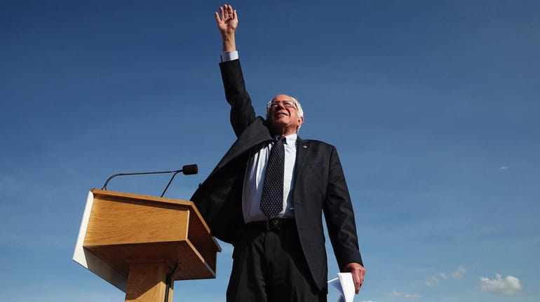 Democratic presidential candidate Sen. Bernie Sanders greets supporters before a...