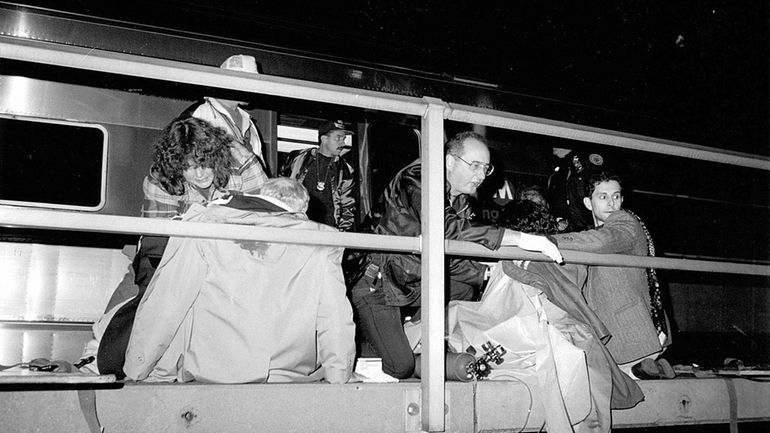 Two of the people injured in the Dec. 7, 1993,...