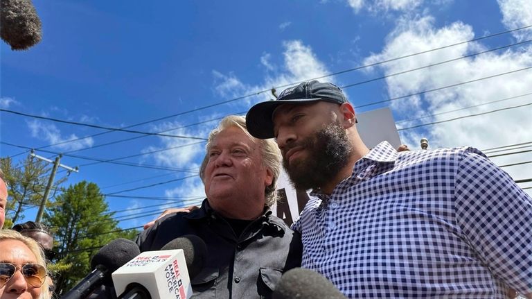 Republican Senate candidate Royce White, right, stands in solidarity with...