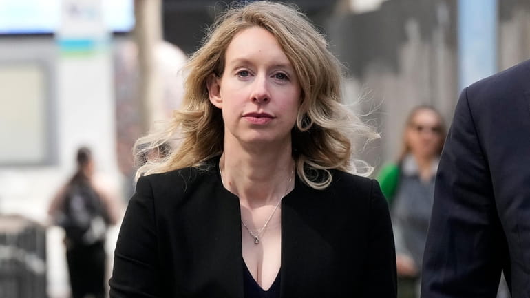 Former Theranos CEO Elizabeth Holmes leaves federal court in San...
