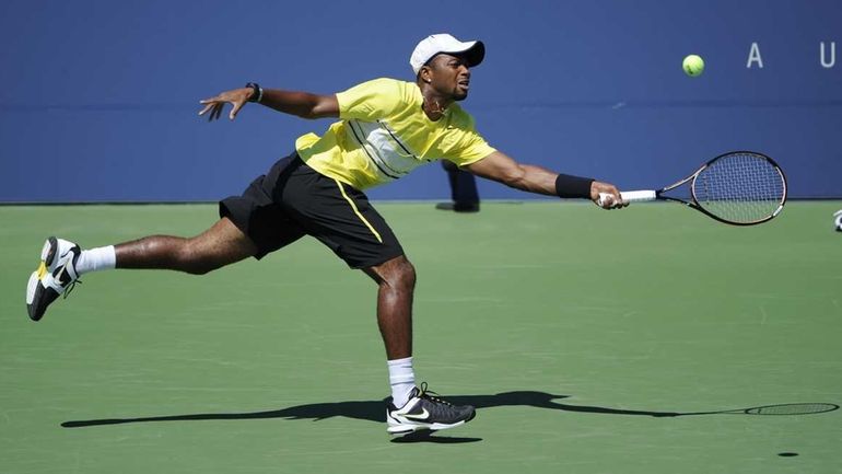 Donald Young of the USA returns the ball to Lukas...