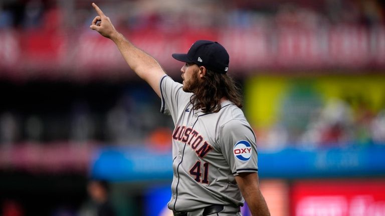 Houston Astros pitcher Spencer Arrighetti reacts after Philadelphia Phillies' Brandon...