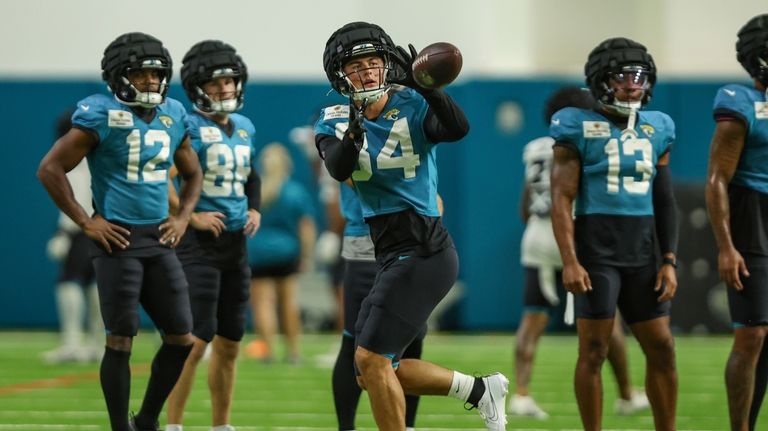 Jacksonville Jaguars wide receiver Louis Rees-Zammit catches a pass during...