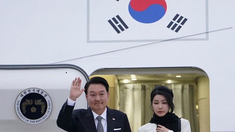 South Korea's President Yoon Suk Yeol and first lady Kim...