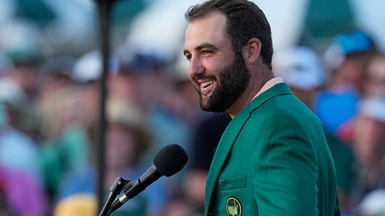 Scottie Scheffler speaks after winning the Masters golf tournament at...