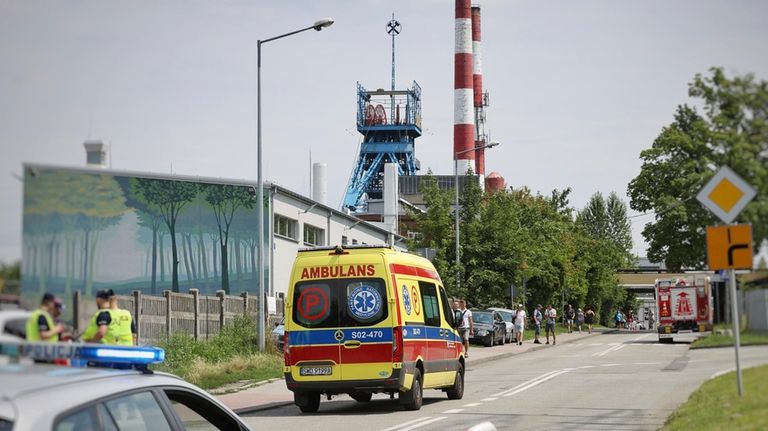 An ambulance heads into the Rydultowy coal mine near the...